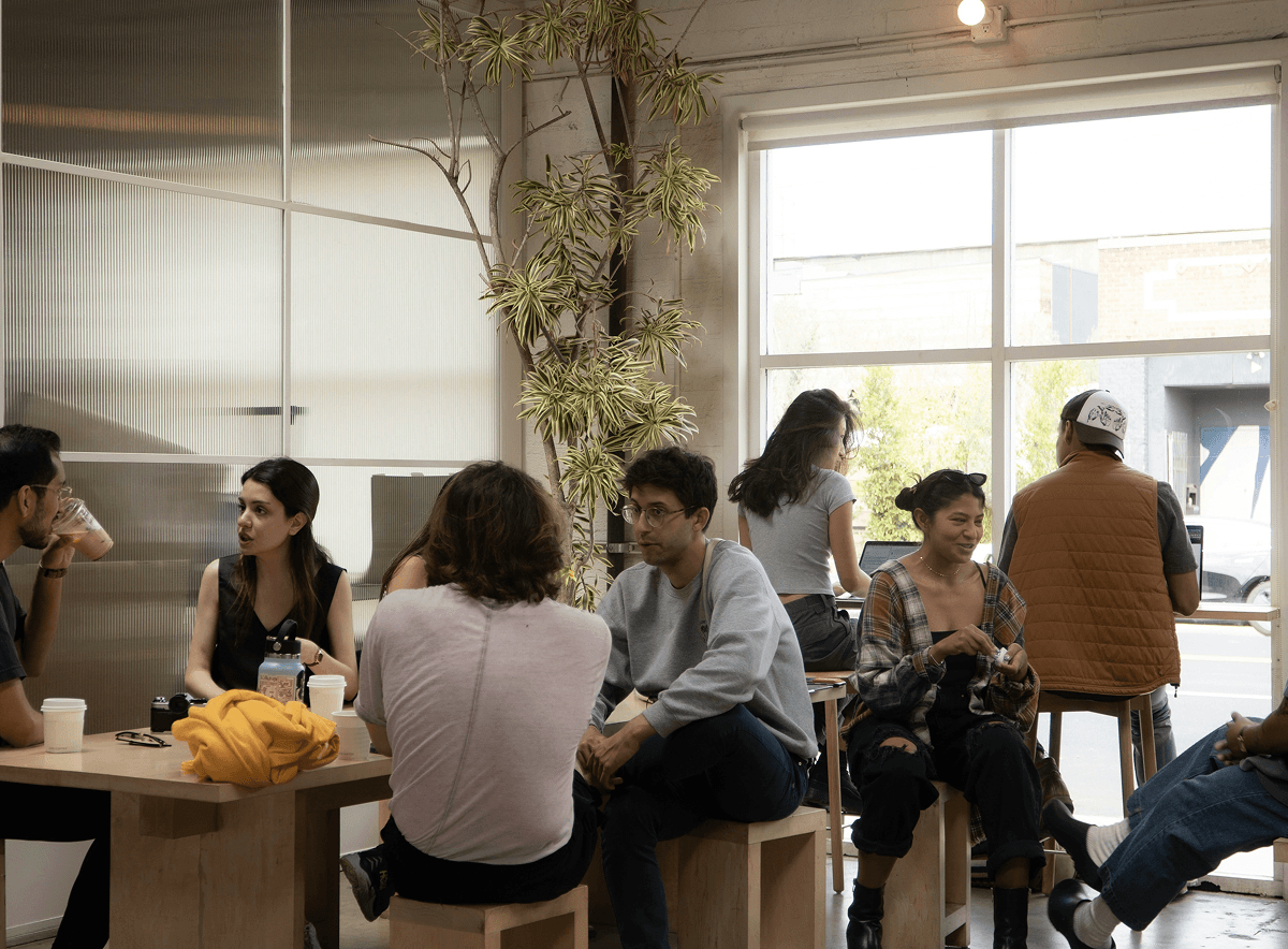 Group of colleagues sat together talking