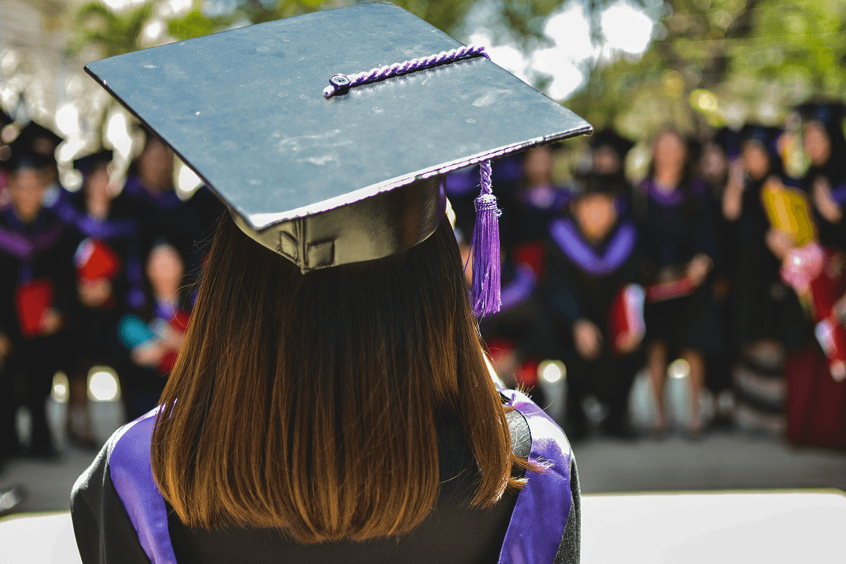 Student in a graduation gown and cap